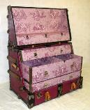 Dresser trunk restored and relined in fabric