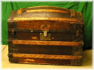 A beautiful leather covered trunk, with  the inside restored, leather redone, outside tin refinished, new tray, slats refinished, new lid lifter.