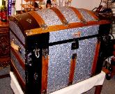 Embossed tin trunk , blue and silver, restored